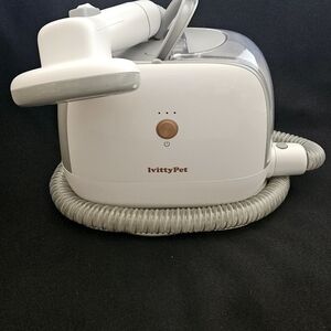 Grooming and drying vacuum